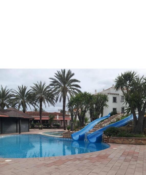 En Denia, Urbanizacion El Palmar Con Piscina, Toboganes Y Chiringuito Apartment Bagian luar foto